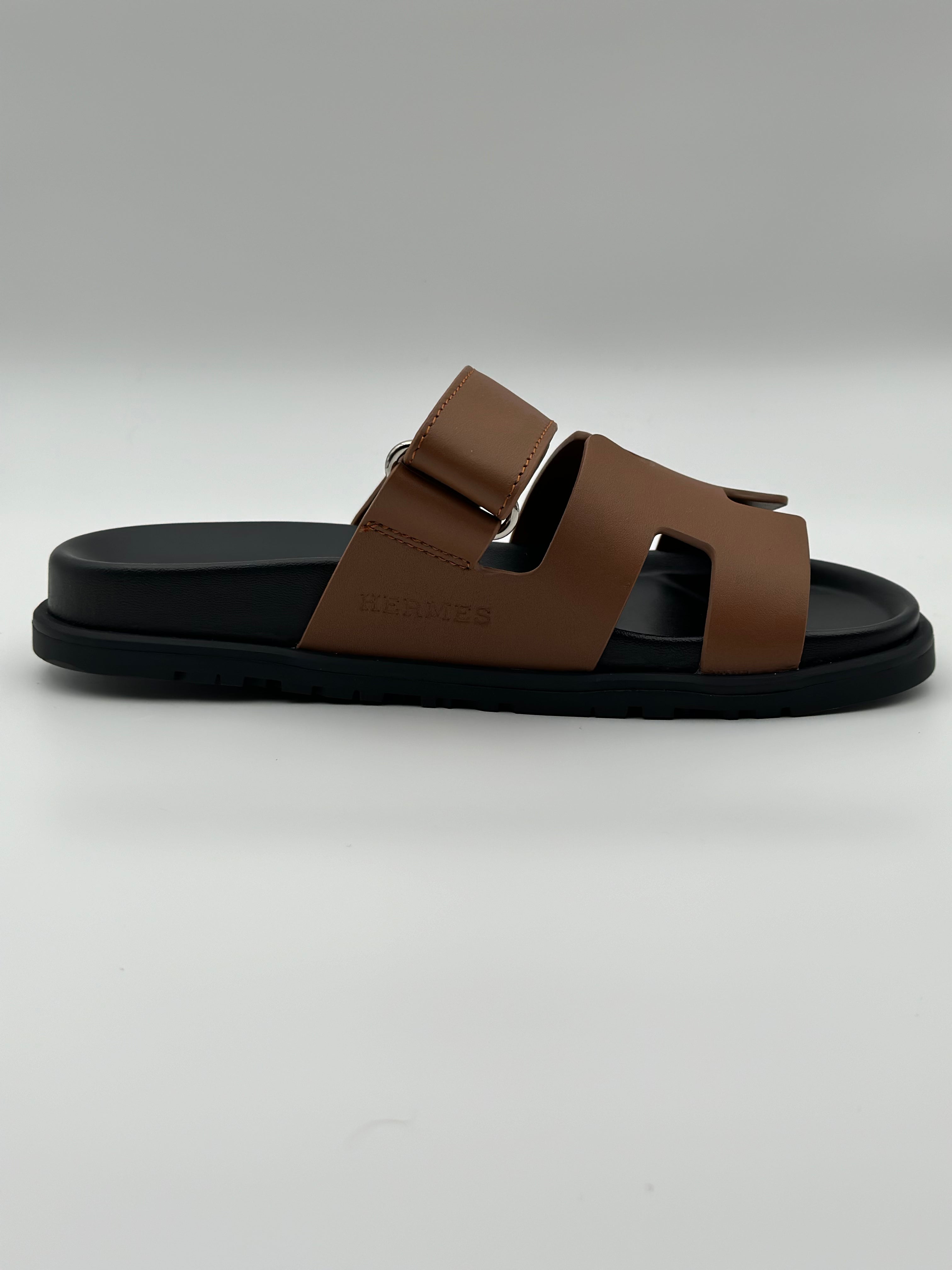 Hermes Chypre leather sandal " Black / Brown"