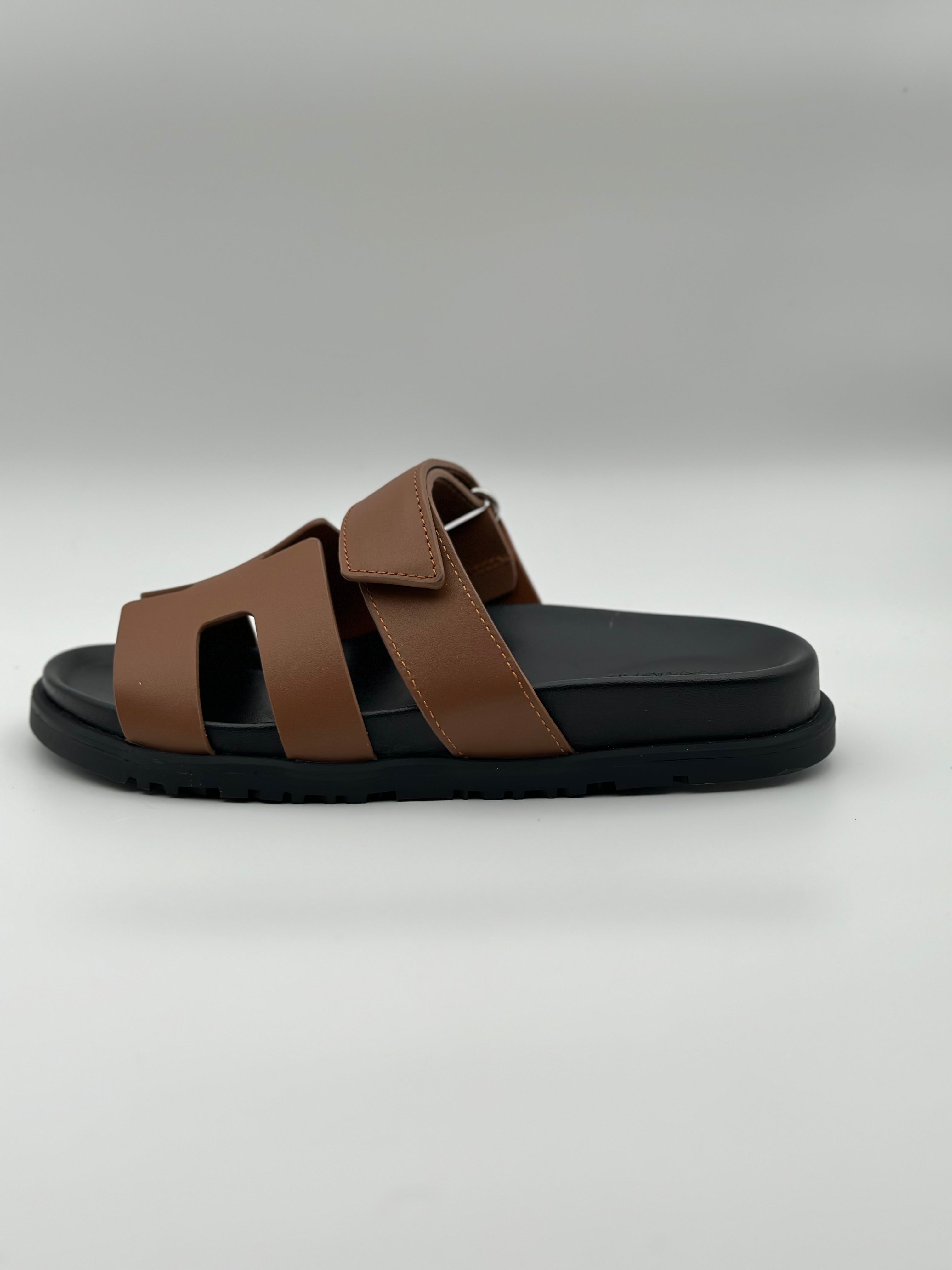 Hermes Chypre leather sandal " Black / Brown"